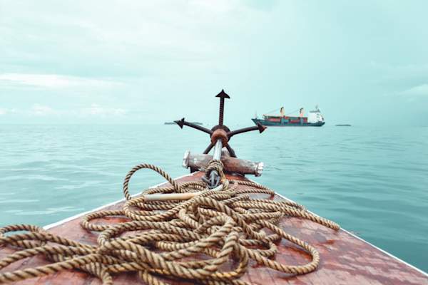 Anchor on edge of boat