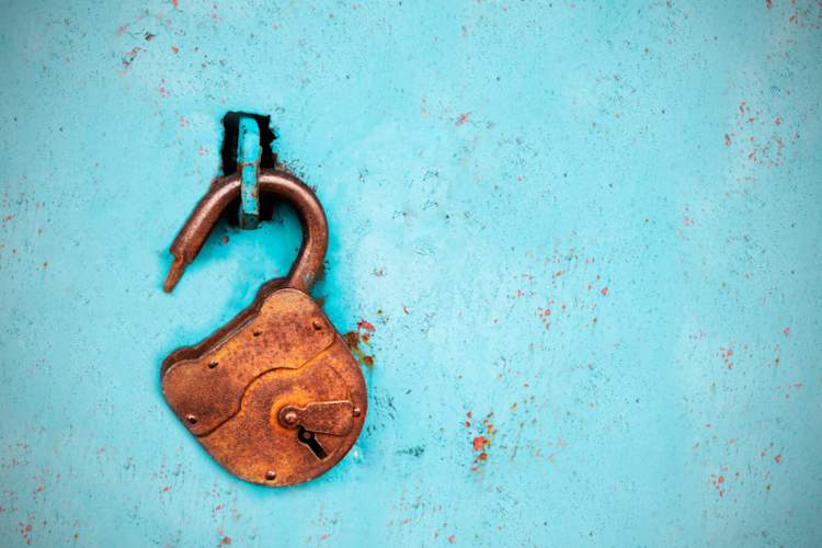 open padlock on blue background