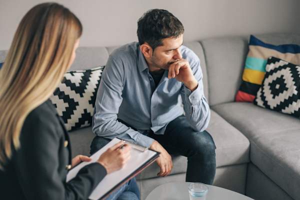 man in therapy session