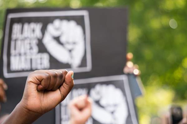 Fist raised at Black Lives Matter Protest