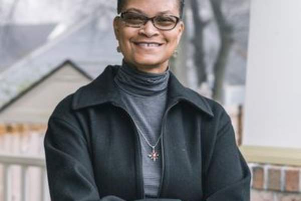 Tonia Poteat, standing outside and smiling, 2019