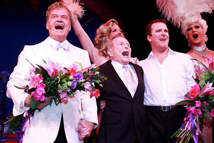 (L-R) Kelsey Grammer, Jerry Herman, and Douglas Hodges at the curtain call for the opening of "La Cage Aux Folles" on Broadway at the Longacre Theatre on April 18, 2010 in New York City.