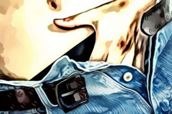 Man reaching into open jeans