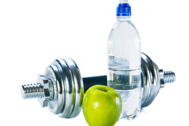water, dumbell and apple