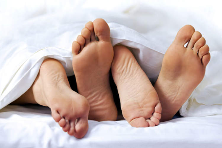 feet in bed