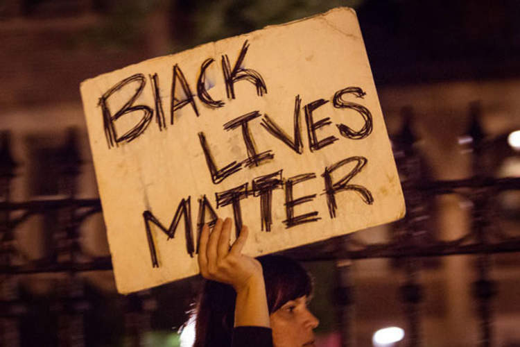 Protester outside the residence of the governor in Saint Paul, Minnesota