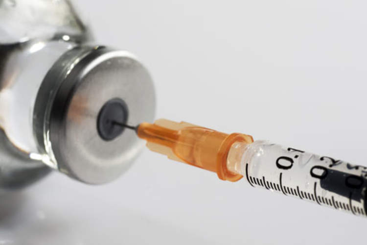 vaccine and syringe