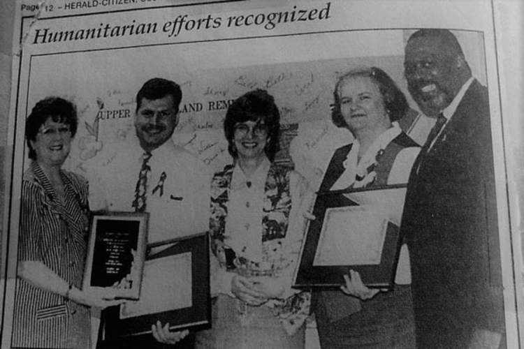 Harold Scott in 1995, with a recipient of a humanitarian award named in his honor