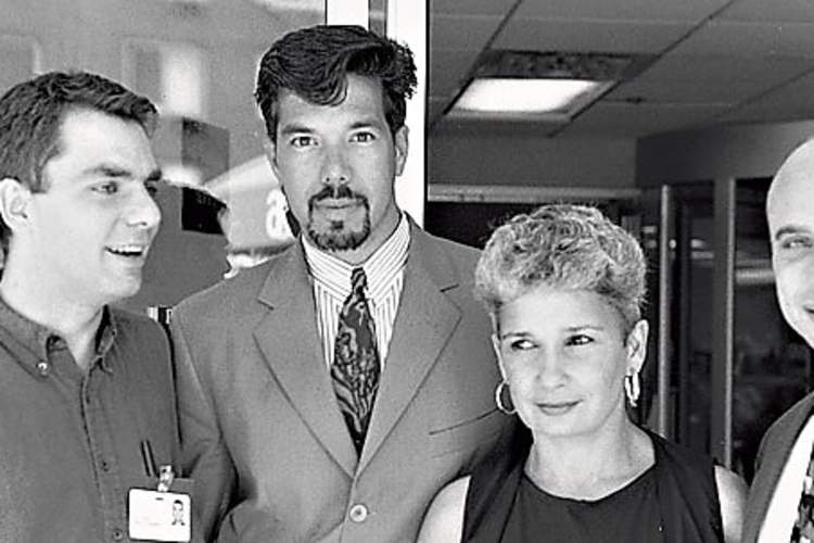 Torres, second from left, with St. Vincent's staff in 1992