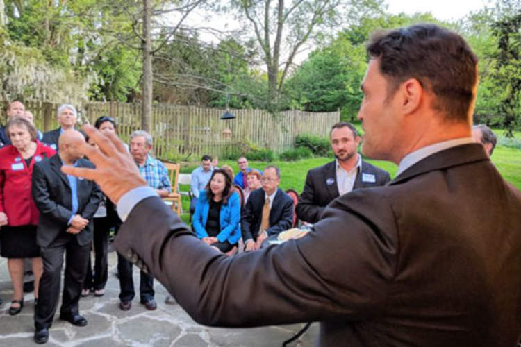 Kevin Mack speaks to supporters in Potomac, Maryland