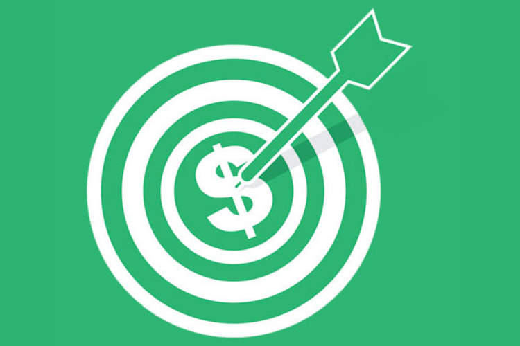 Arrow hitting dollar sign bullseye