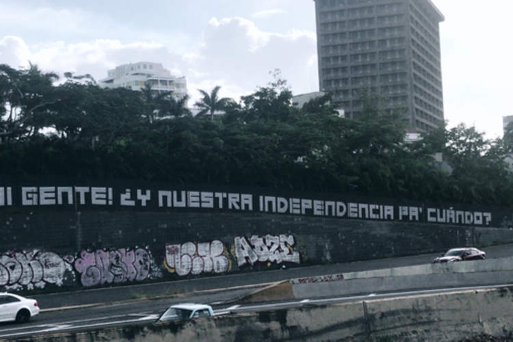 Graffiti in San Juan, Puerto Rico states 'My People! When Will We Get Our Independence?'