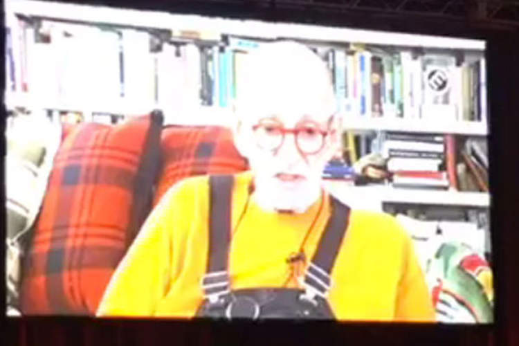 Larry Kramer addresses USCA 2018 attendees via video