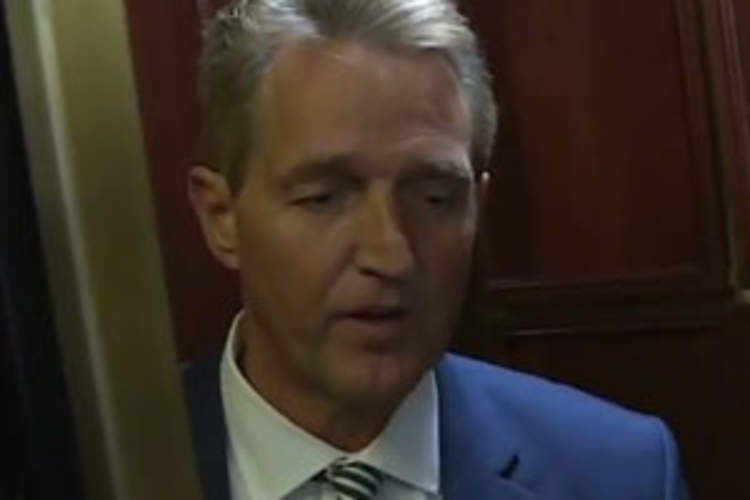 How HIV Activists Helped Create the Jeff Flake Elevator Moment Img