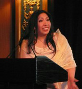 Gracia accepting the Keith Cyler AIDS Activist Award.