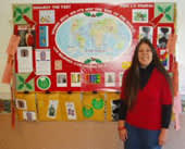 On World AIDS Day, Dec. 1, 2006, in front of a display on women and HIV at the Placerville, Calif. Public Health Department. Loreen and a colleague created the display to offer much-needed HIV education to both Spanish- and English-speaking women in the a