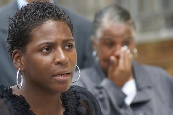 Edwards, at a tearful press conference last May, before she received housing and a job.