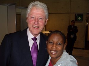 President Clinton and Haitian AIDS activist Esther Boucicault.