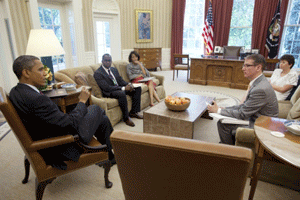 President Barack Obama holds meeting on AIDS policy with members of the Domestic Policy Council in the Oval Office, July 12, 2011.
