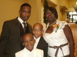 Millicent with her youngest son and two grandsons.