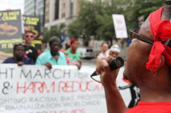 Photo: Venton Jones, HIV PJA Steering Committee Co-Chair, leads the call at the recent We Can End AIDS Mobilization in Washington, D.C.