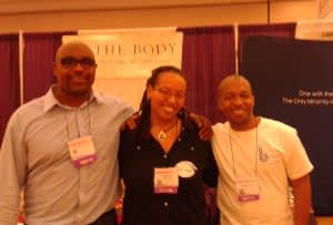 Jason and Reggie with Olivia, between their two companies' exhibit booths at the U.S. Conference on AIDS in 2012.