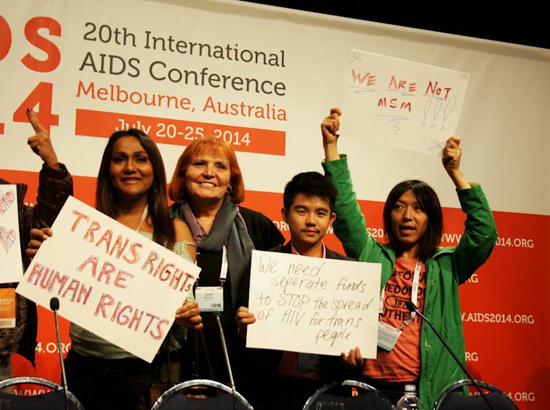 JoAnne Keatley, in center without sign. (Photo: International AIDS Society/Elisabetta Fino)