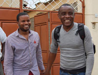 Alternatives-Cameroun's Yves Yomb (right) with John Mathenge (left), director of HOYMAS.
