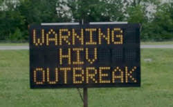 'Warning HIV Outbreak' road sign