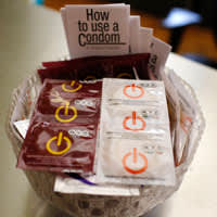 Telling people to use a condom won't prevent HIV because some women can't convince their partner to use them. (Credit: Mike Segar/Reuters)