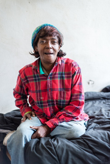 Loren Jones, 63, at her apartment in Berkeley, California on Dec. 17, 2015. Jones was homeless when she was diagnosed with HIV. (Heidi de Marco/KHN)
