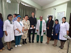 Dr. Lo (third from right) visits a community-based viral hepatitis treatment facility in Ulaanbaatar, Mongolia.