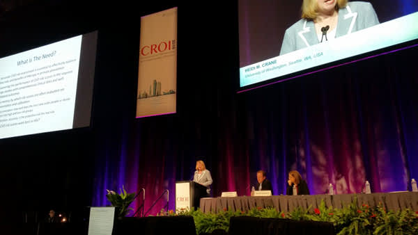 Heidi Crane presents in the auditorium of Boston's Hynes Convention Center during CROI 2016.