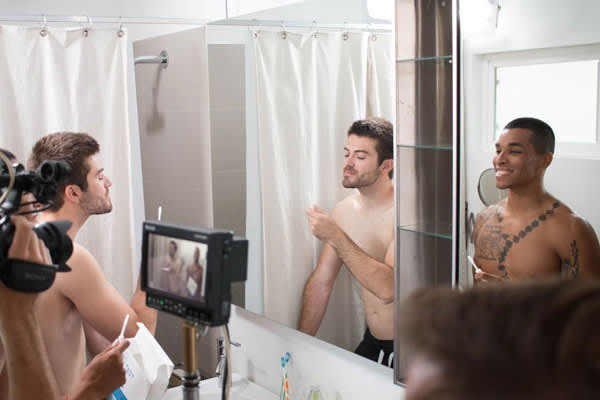 In this behind-the-scenes shot, the crew films actors playing a new couple from the nightclub who take a home HIV test together