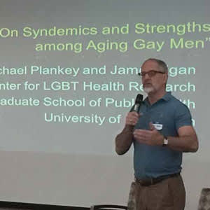 Ron Stall discusses how many gay men have experienced twin epidemics, HIV/AIDS and a culture of violence and victimization while growing up, at The Reunion Project in Palm Springs, November 2015