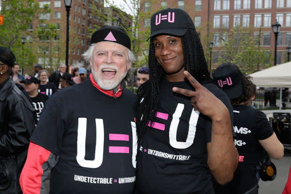 Housing Works' head Charles King with one of the U=U dance partygoers