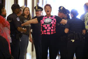 Barb Cardell getting arrested