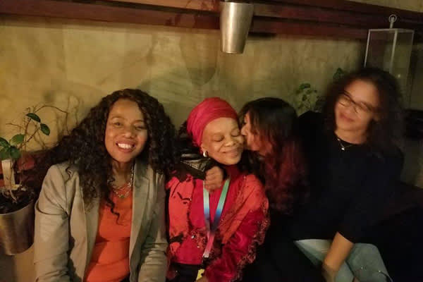 Mabele (far left), with Khanna (second from right) and sister advocates, relaxing in Durban