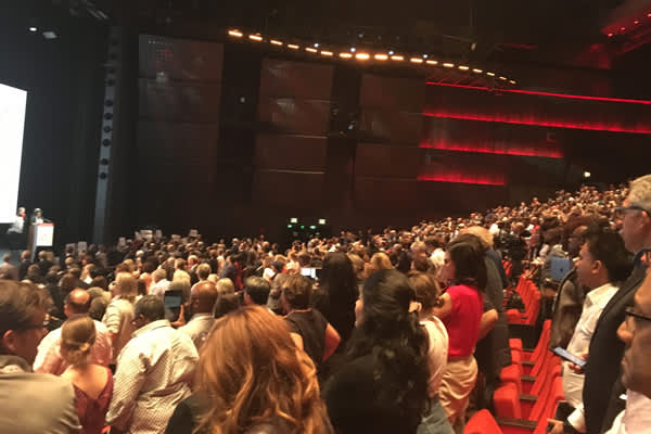 IAS 2017 attendees stand for a pledge (Credit: Warren Tong)