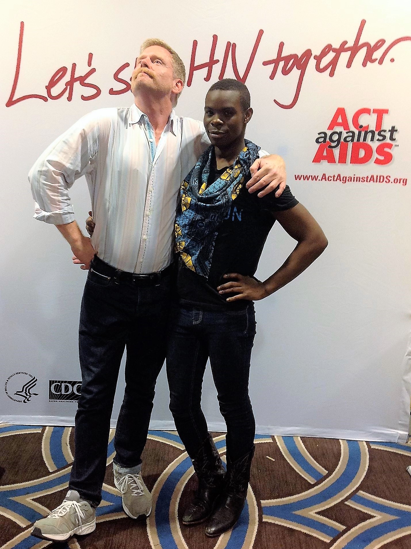 Mark S. King and Antron Reshaud Olukayode at the 2013 U.S. Conference on AIDS