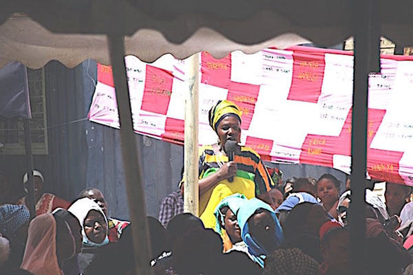 Peer leader speaks to the sex worker community at the annual Baraza (community meeting) in Nairobi, Kenya