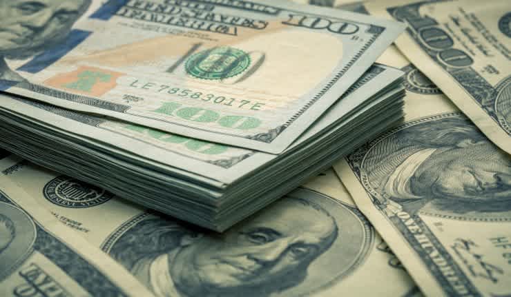 This is a photo of a stack of $100 dollar bills.