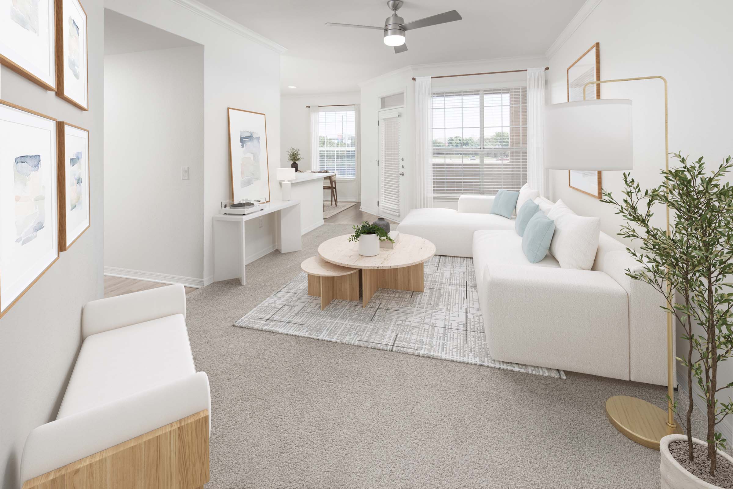 Open living room with carpet and private balcony at Camden Addison apartments in Addison, TX