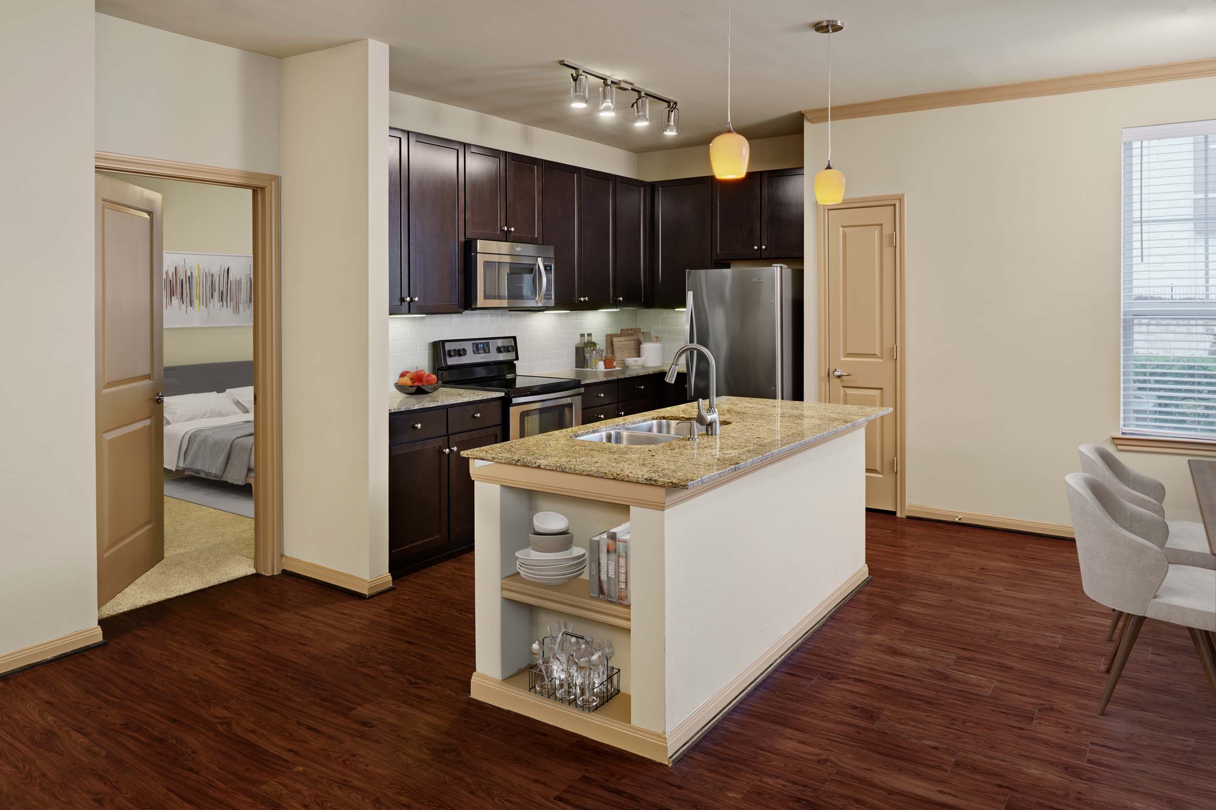 Kitchen with island and stainless steel appliances
