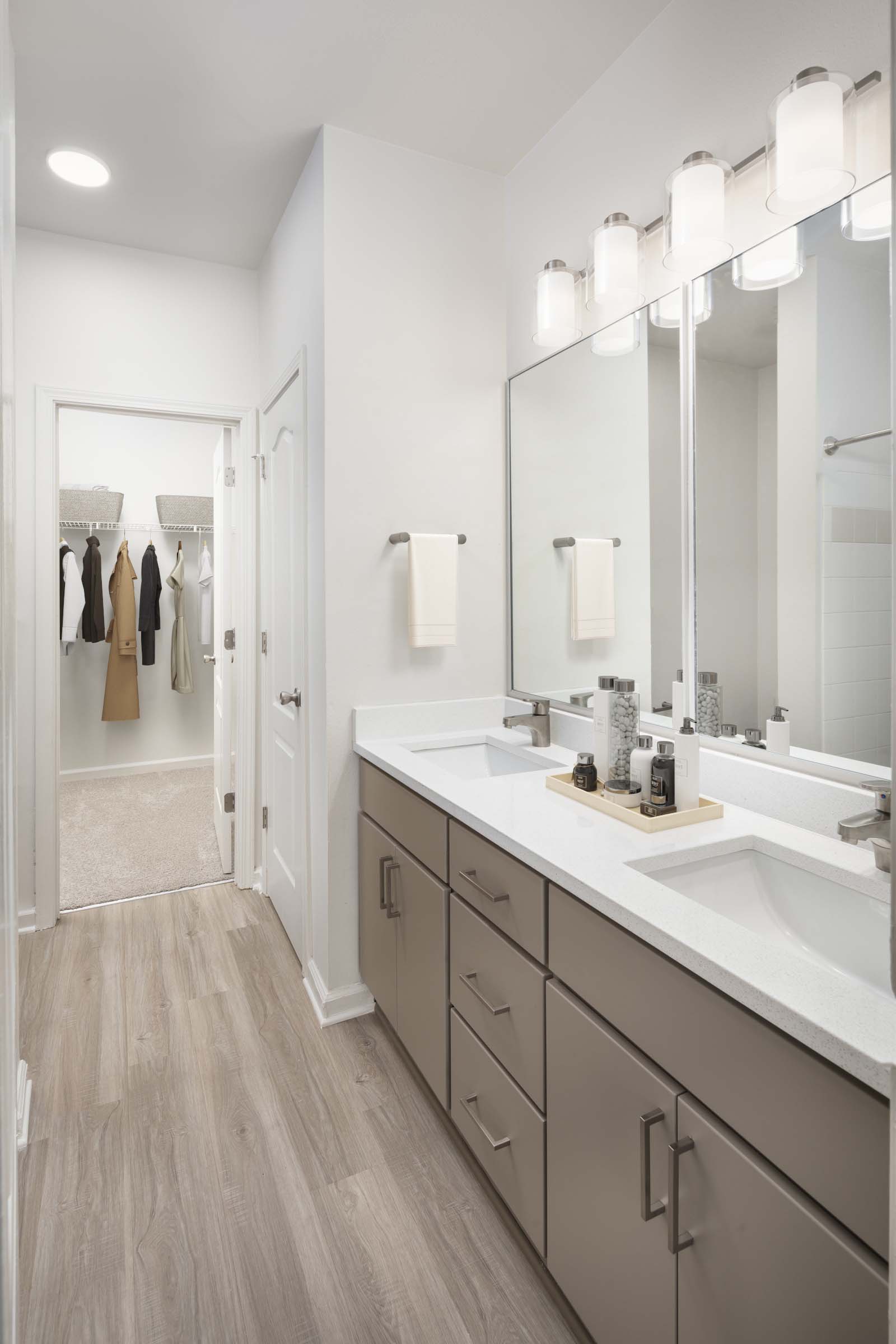 Bathrooms with double sink vanities at Camden Westwood apartments in Morrisville, NC