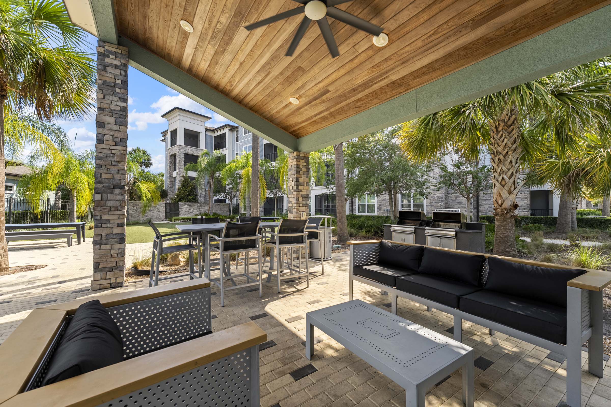 Outdoor resident lounge at Camden Lake Buena Vista apartments in Orlando, FL