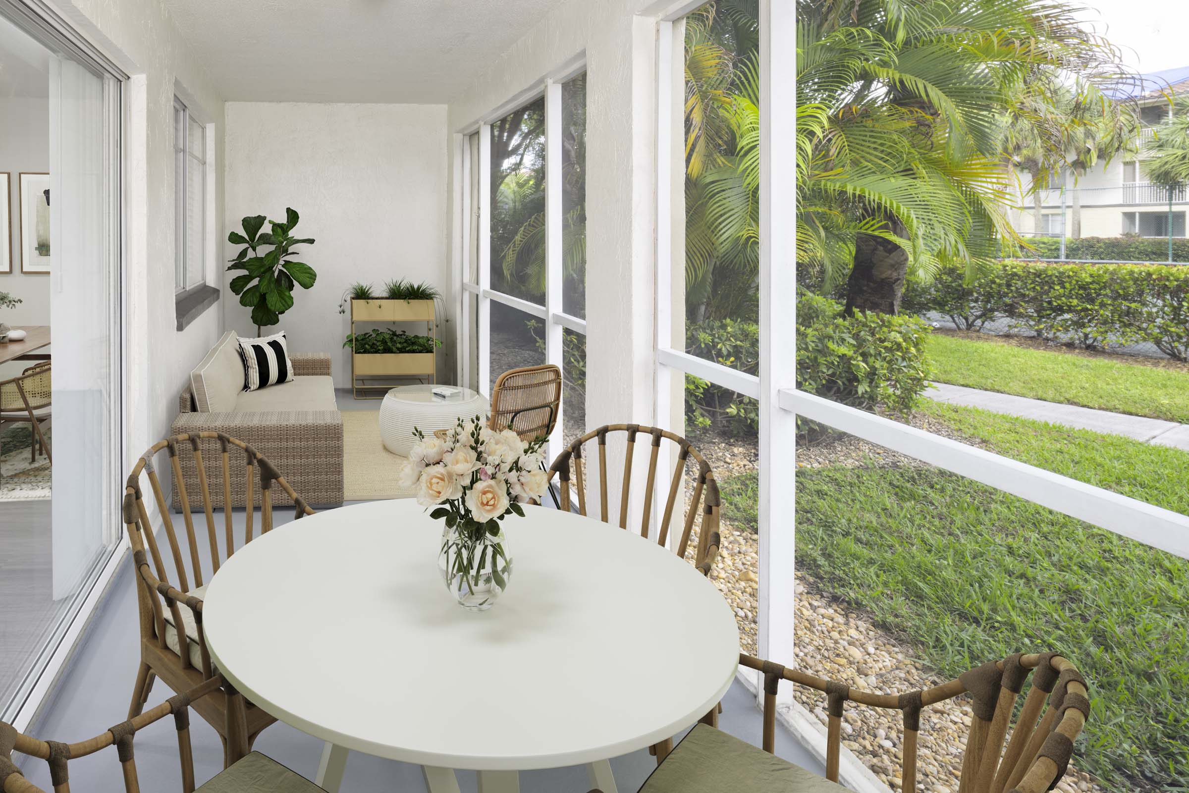Screened-in covered patio in the Alberti floorplan at Camden Portofino in Pembroke Pines, FL.
