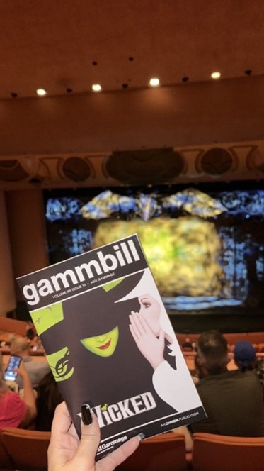 View of a Wicked musical playbill with the stage and theater in the background, taken at ASU Gammage theater
Photo courtesy of Jourdan Garcia's best freind, Josie