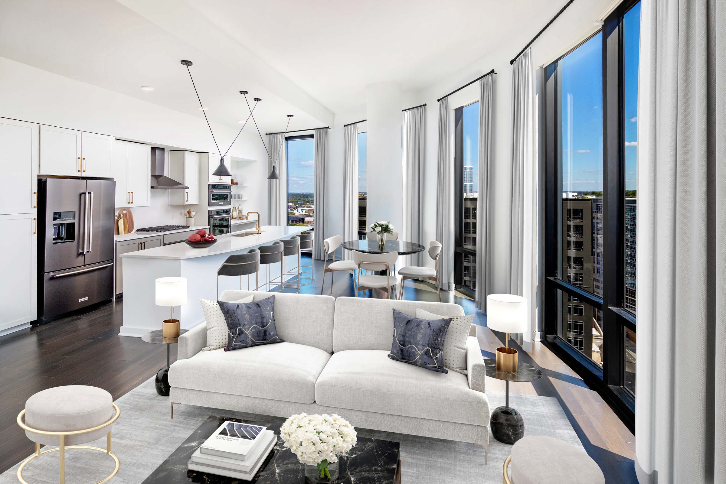 Penthouse living, dining, and kitchen at Camden Gulch apartments in Nashville, TN