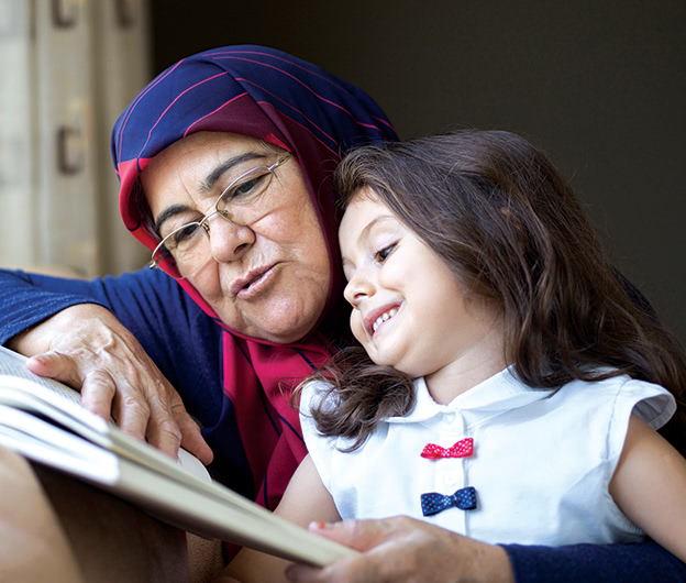 Grandmother-reads-with-girl